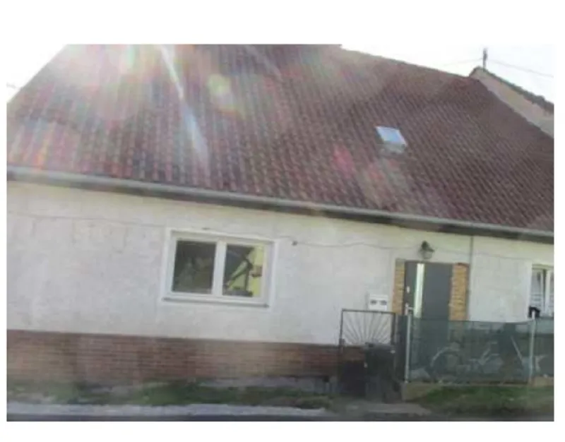 Rodinný dům s pozemky v obci Podmokly