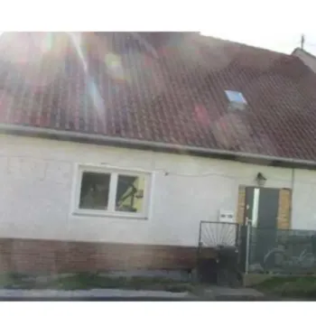 Rodinný dům s pozemky v obci Podmokly